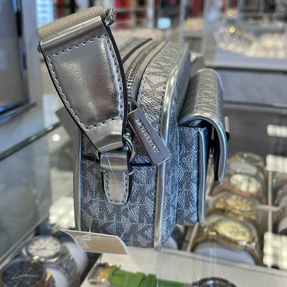 Michael Kors Bradshaw Extra-Sm Metallic Signature Logo Camera Crossbody
Silver - Picture 3 of 16
